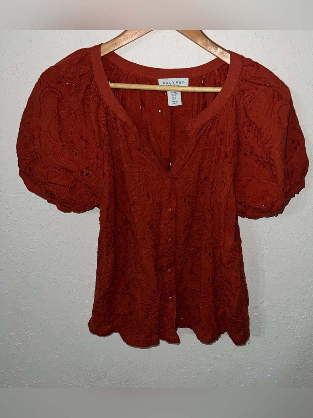 Calypso St. Barth Size Medium Rustic Orange
Eyelet Puff Sleeve Buttoned Top